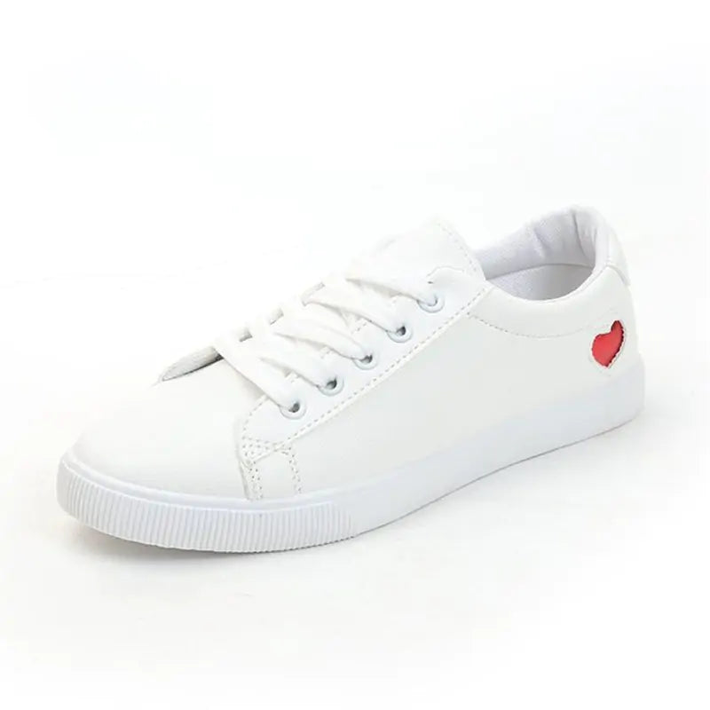 Skate White Shoes with Breathable Fabric and Heart Cut-Outs - Stylish and Comfortable!