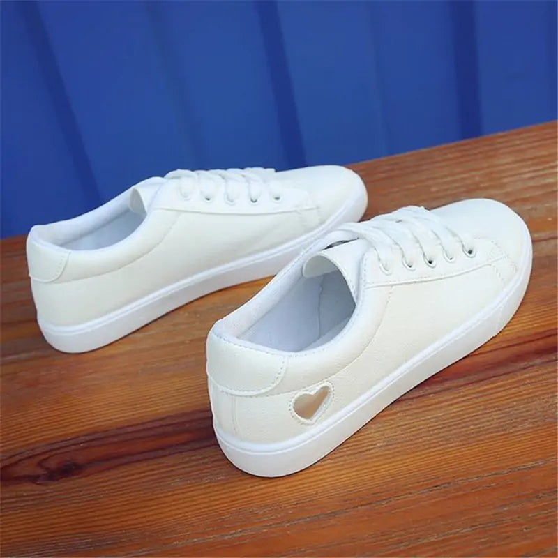 Skate White Shoes with Breathable Fabric and Heart Cut-Outs - Stylish and Comfortable!