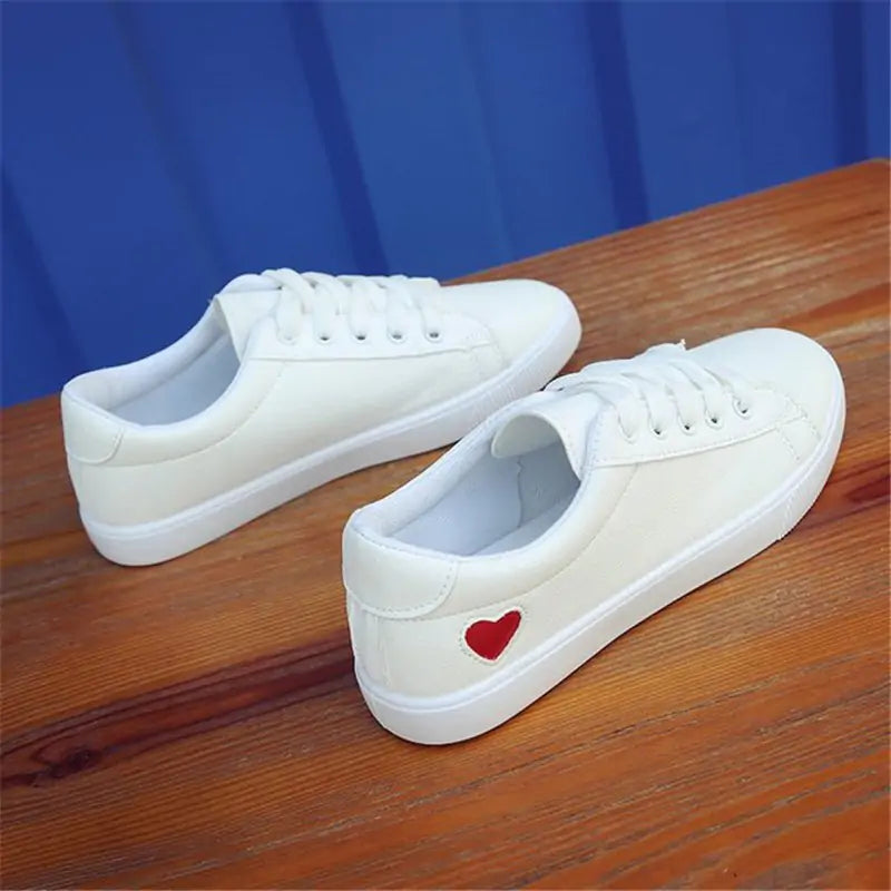 Skate White Shoes with Breathable Fabric and Heart Cut-Outs - Stylish and Comfortable!